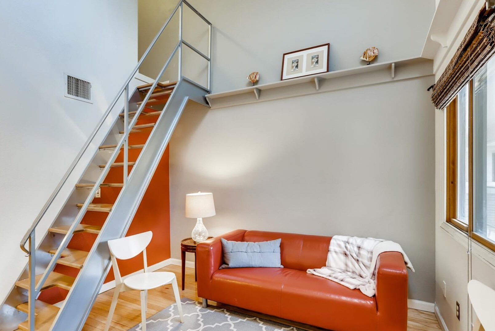 Living room and stairs up to loft - 1085 Broadway St