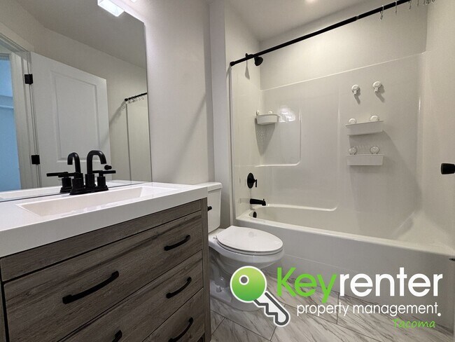 Building Photo - Stylish 4-Bedroom Home with Finished Basem...