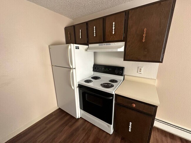 Experience culinary magic in this well-appointed kitchen, ideal for both intimate meals and grand feasts. - Country Club