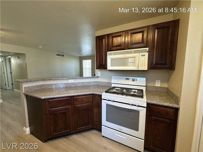 Building Photo - Fantastic NW second-floor unit with a welcoming layout and great natural flow!