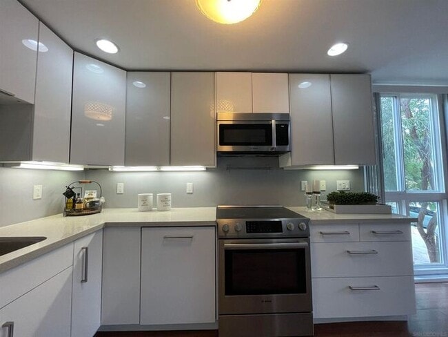 Building Photo - Updated Gated Condo with Pool Access Near SDSU & Shopping