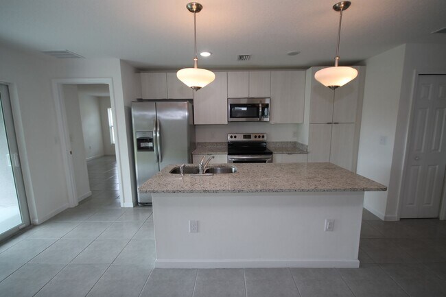 Building Photo - Stunning 4BR/2BA Palm Bay Retreat with Modern Upgrades & Oversized Lot!!