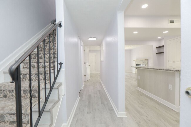 Building Photo - "Beautifully Updated Townhome – Ready for ...