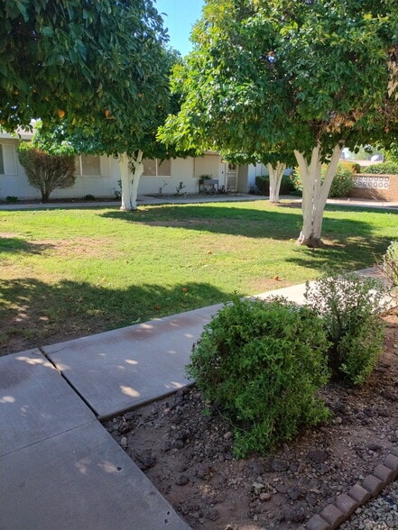Community courtyard outside front door - 10620 W Coggins Dr