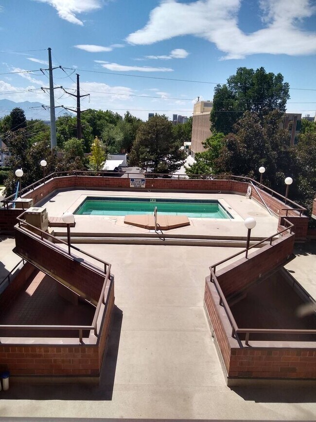 Building Photo - Incredible Location with 2 secure parking spaced