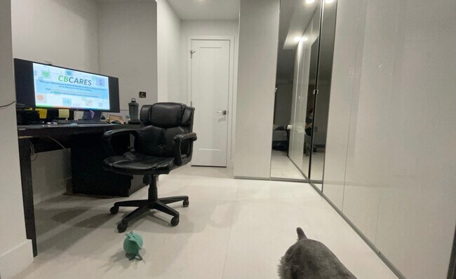 Closet exterior. Bathroom door shown. - 7505 SW 82nd St