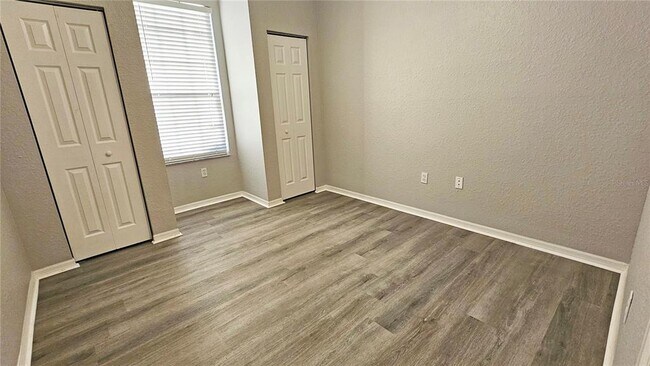 Building Photo - 9018 Lake Chase Island Way