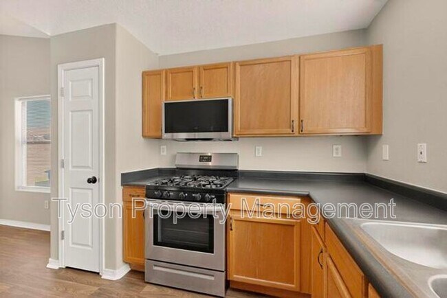 Building Photo - 7705 Button Quail Ave NW