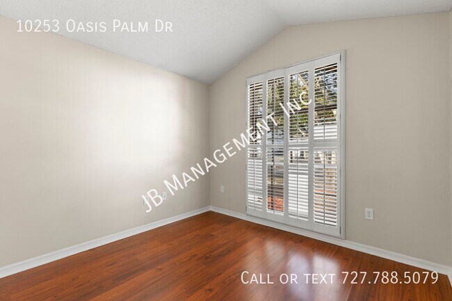 Building Photo - 10253 Oasis Palm Dr