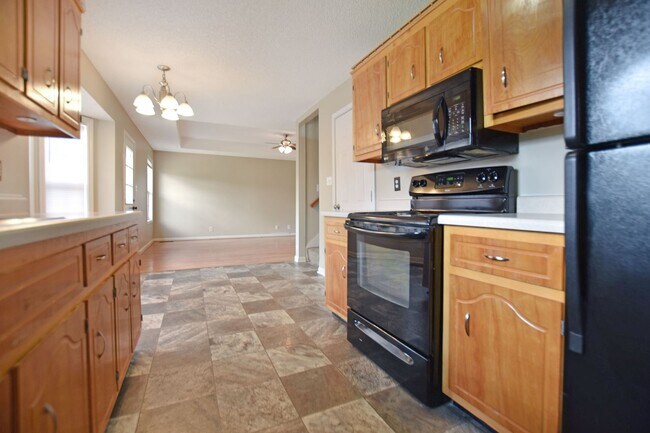 Building Photo - Pet Friendly Three Bedroom with Bonus!