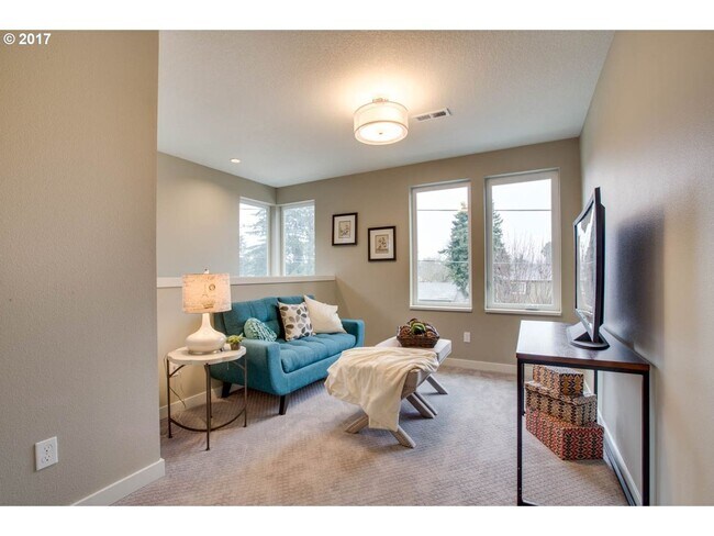 Building Photo - Charming 3BR Home with Fireplace, Bright Open Living Spaces & Loft