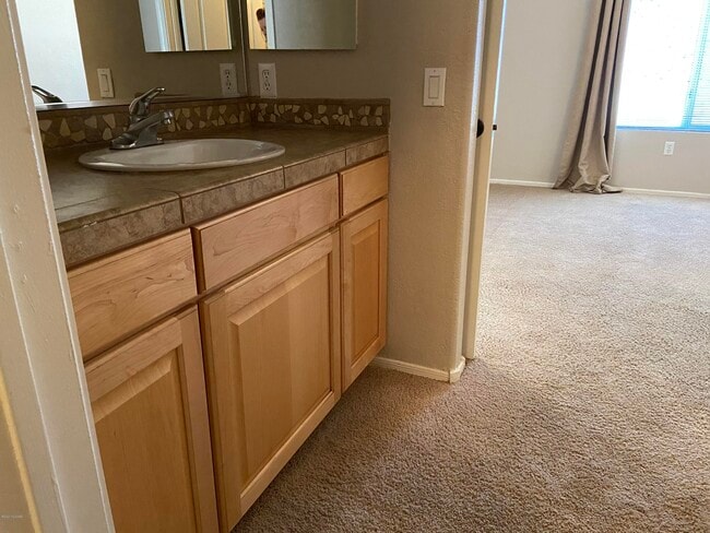 Building Photo - 7050 E Sunrise Dr