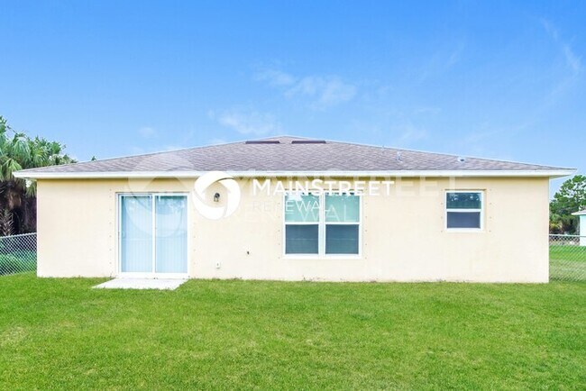 Building Photo - 4 Bedroom Pet-Friendly Home in PALM BAY, FL with Main Street Renewal