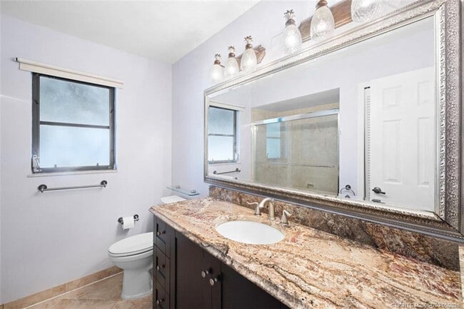 Building Photo - 3074 NE Loquat Ln