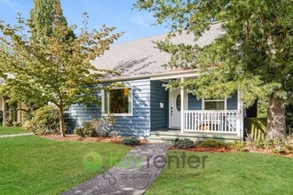 Building Photo - Remodeled Five Bedroom Retreat with Yard a...