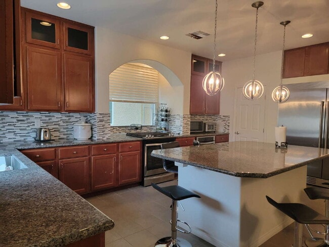 Building Photo - 4 bedroom home with a fully self  contained casita with a 3 car garage