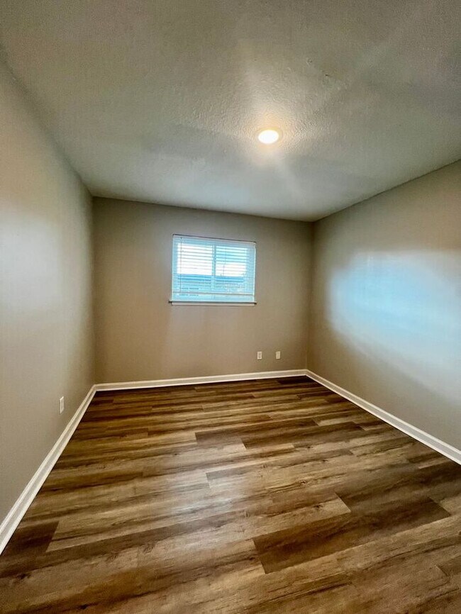 Building Photo - Your Spring Upgrade Starts at The Den