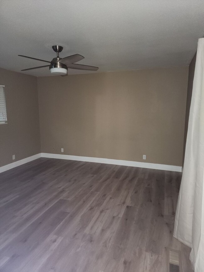 Building Photo - 3 Bedroom 2 bath with 2 car garage off of ...