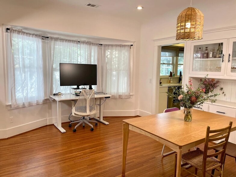 Flexible dining area that works perfectly as a home office or creative space. - 6000 Carlton Way