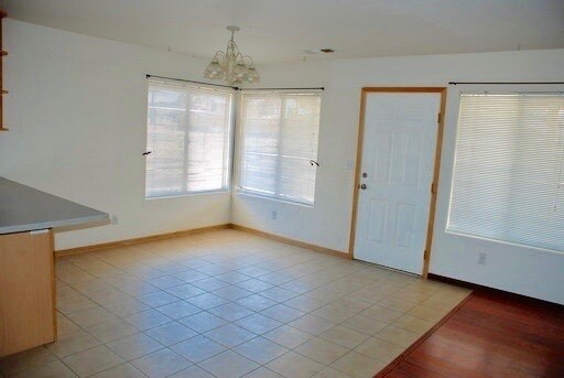 Building Photo - 3 Bedroom Home, garage, fenced yard.