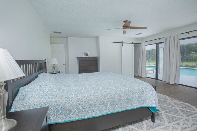 Building Photo - Beautifully Updated 3/2 Pool Home with Lar...