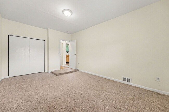 Building Photo - Spacious 3-Bedroom Home with Refinished Hardwood Floors, Fresh Interior Paint, Private Fenced Yar...