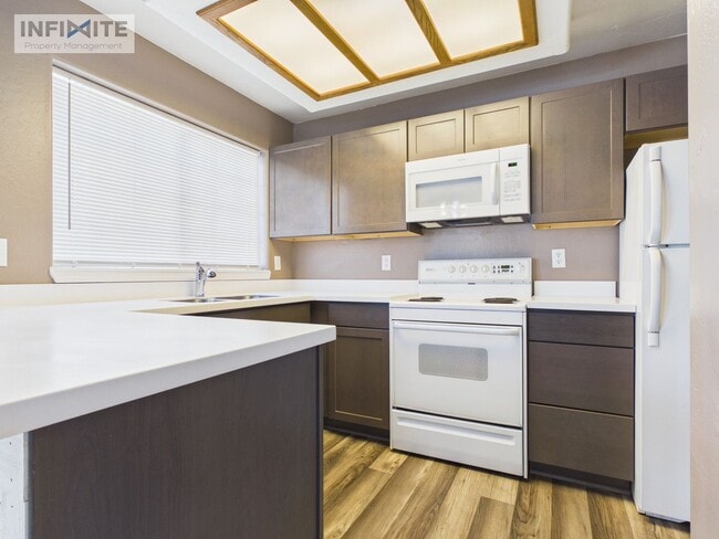 Building Photo - 2 Bedroom | 2 Bathroom Condo Single-Level Lower-Level Living