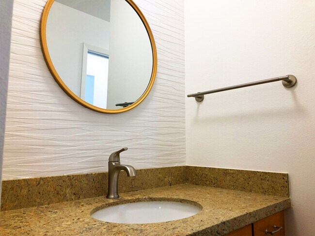 Vanity with custom wall covering - 1925 46th Ave