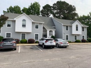 Building Photo - "Charming 2-Bed Condo Oasis with Fireplace...