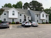 Building Photo - "Charming 2-Bed Condo Oasis with Fireplace...