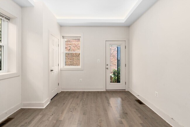 Building Photo - Experience stunning design and modern finishes in Columbia Heights!