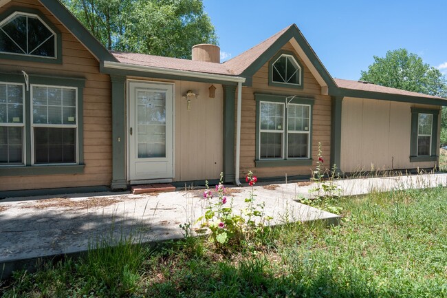 Building Photo - "Charming 3-Bed, 3-Bath Mobile Home on Per...