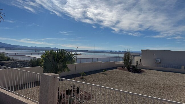 Building Photo - Sunsets, Views & Vibes - Your LHC Escape Awaits!