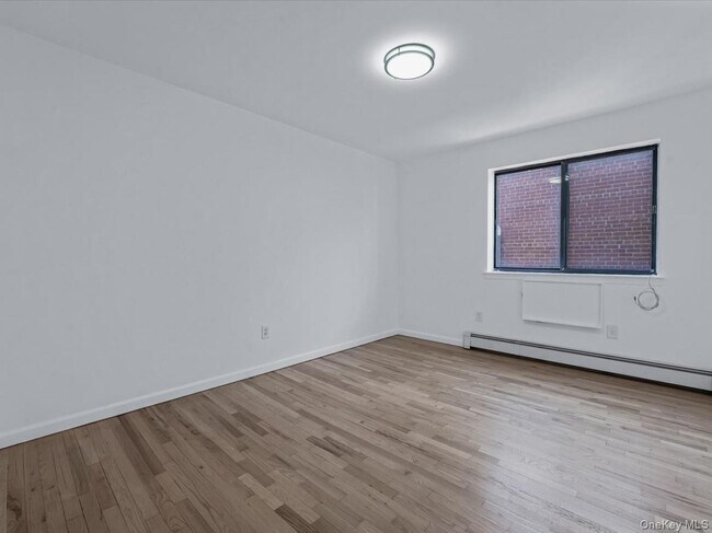 Building Photo - 214-16 40th Ave