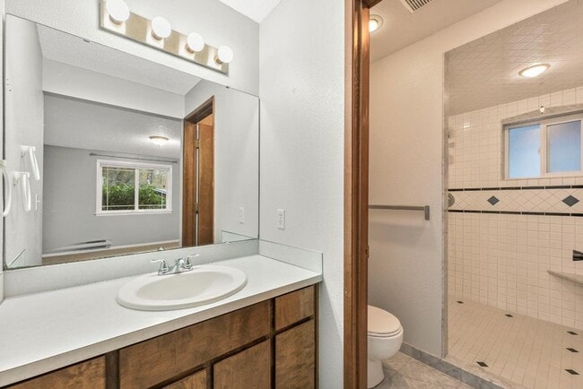 Building Photo - Charming Tacoma Home with A/C, RV Parking, Workshop & Skylit Living Room