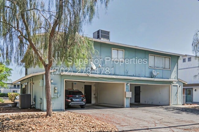Building Photo - SE!! Close to UNLV!! 2 Bedroom 2 story!! 1 Car Carport!! Fully Furnished!! Community Pool!! and T...