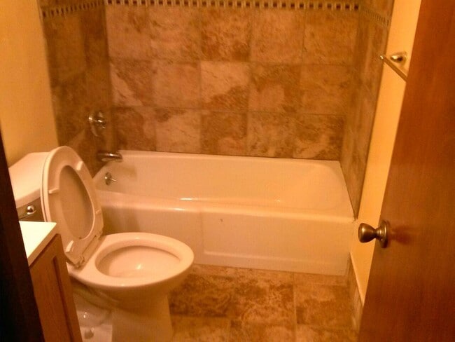 Lovely bathroom with ceramic tiled walls and floor - 4323 Marshall Ave