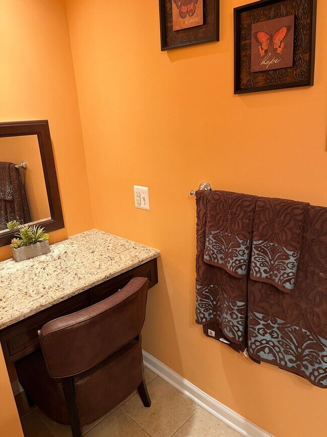 Building Photo - Updated & Landscaped 4 Bedroom, 4 Bath Hom...