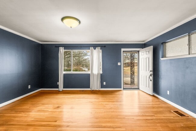 Building Photo - Updated 3BR/2BA Brick Home with Hardwood Floors & Large Yard