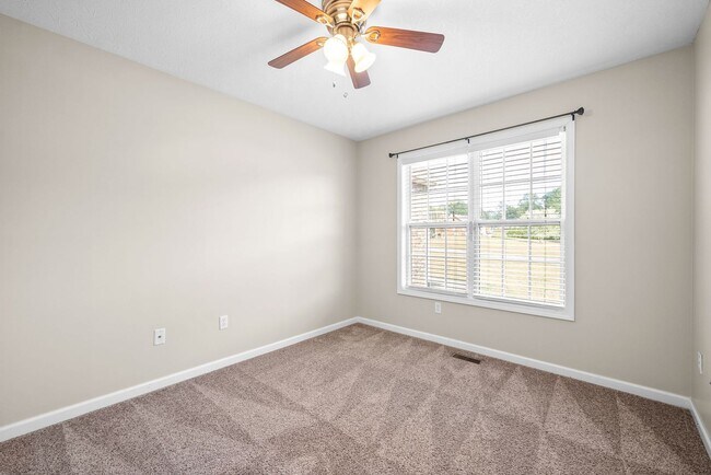Building Photo - Pet Friendly Three Bedroom with Bonus!