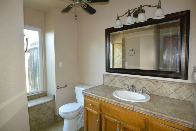 Building Photo - SW 3 Bedroom 2 Bath home with Pool. Yard Care Included.