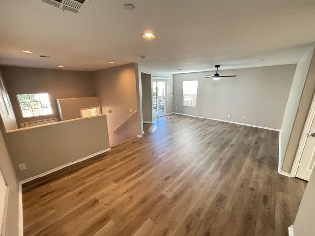 Building Photo - Spacious Tri-Level 4-Bedroom Home with Bal...