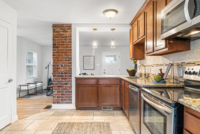 Building Photo - Beautiful Open Concept Brick Ranch blocks ...