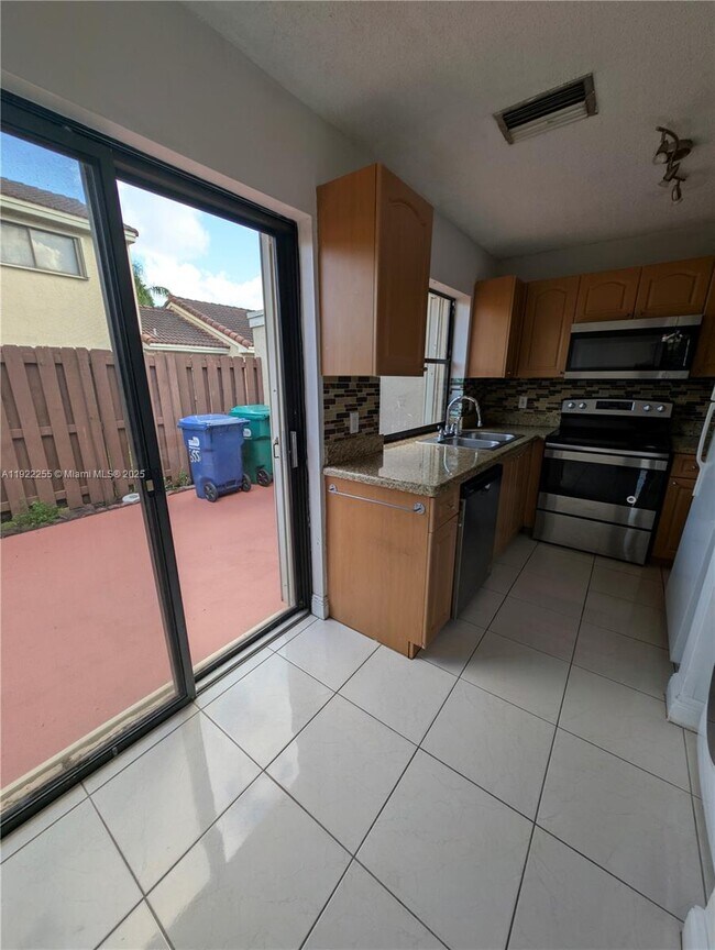 Building Photo - 6551 NW 170th Terrace