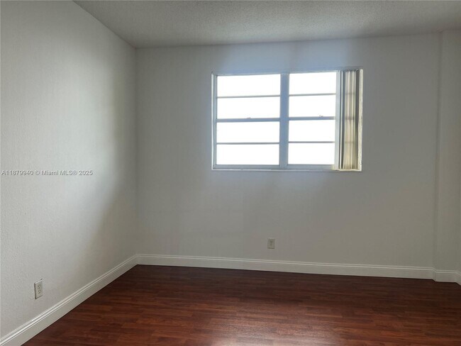Building Photo - 19390 Collins Ave