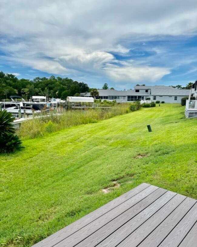 Building Photo - Beautiful Waterfront 2/2 Furnished Condo with community pool!