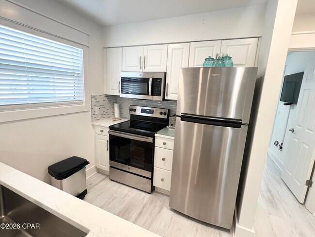 Building Photo - 7813 N Lagoon Dr