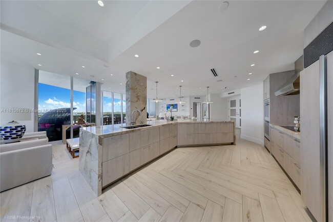 Building Photo - 10225 Collins Ave