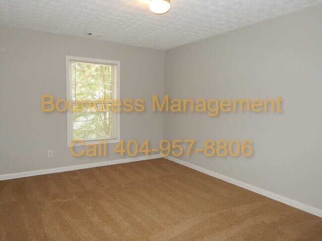 Building Photo - Larger Than It Looks! 3 BR/2.5 BA Town Hom...
