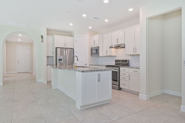 Building Photo - NOW AVAILABLE - 2/2 Plus Den Single Family Home in the Heart of Estero!